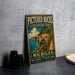 A vintage-style metal sign for the Pictured Rocks Lakeshore Trail in Michigan, featuring a scenic landscape with a lake, cliffs, and a path leading to a waterfall.