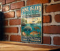 A vintage-style metal sign for Pine Island Sound Aquatic Preserve in Florida, featuring illustrations of marine life and a sunset over the water.