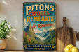 A vintage-style sign for Pitons Cirques et Remparts de La Reunion in France, featuring a mountainous landscape and text.
