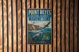 A vintage-style metal sign for Point Reyes National Seashore Marine Zone in California, featuring a lighthouse and marine life.