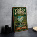 A vintage-style sign for Poison Springs State Forest in Arkansas, featuring a scenic illustration of a forest and a waterfall.
