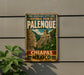 A vintage-style sign for the National Park of Palenque, Mexico, featuring an illustration of a temple and a figure.