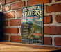 A vintage-style metal sign advertising a hiking trail in New Hampshire, mounted on a brick wall.