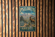 A vintage-style metal sign for Psiloritis Park in Greece, featuring a mountain landscape and a goat.