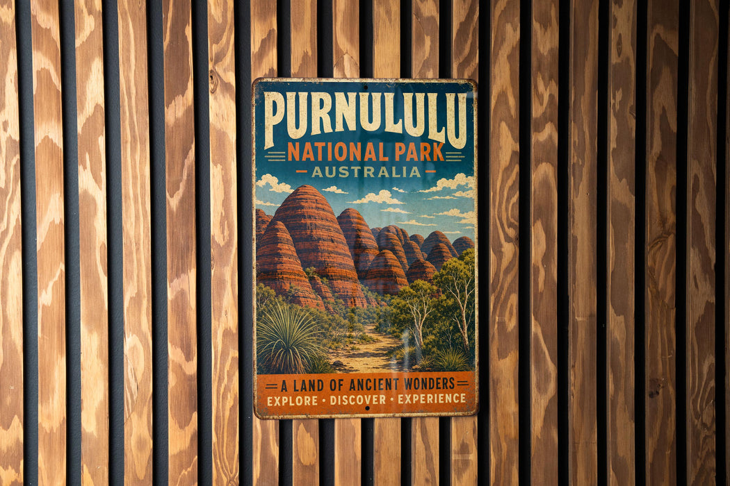 A vintage-style metal sign for Purnululu National Park in Australia, featuring a scenic illustration of the iconic rock formations.