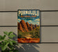 A vintage-style sign for Purnululu National Park in Australia, featuring a scenic illustration of the iconic rock formations.