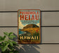 A vintage-style sign for the Puukohola Heiau National Historic Site in Hawaii, featuring a tropical landscape with a mountain and palm trees.