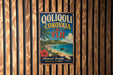 A vintage-style metal sign with the text "QOLIQOLI COKOVATA Fiji" and a tropical beach scene, hanging on a wooden wall.