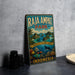 A vintage-style metal sign for Raja Ampat Park in Indonesia, featuring a tropical landscape with palm trees, coral reefs, and marine life.