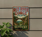 A vintage-style metal sign for the Red River Gorge Trail System in Kentucky, featuring a scenic illustration of the famous rock arch.