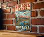 A vintage-style metal sign for the Red Rock Lakes National Wildlife Refuge in Montana, featuring an illustration of a bird and a duck in a natural setting.