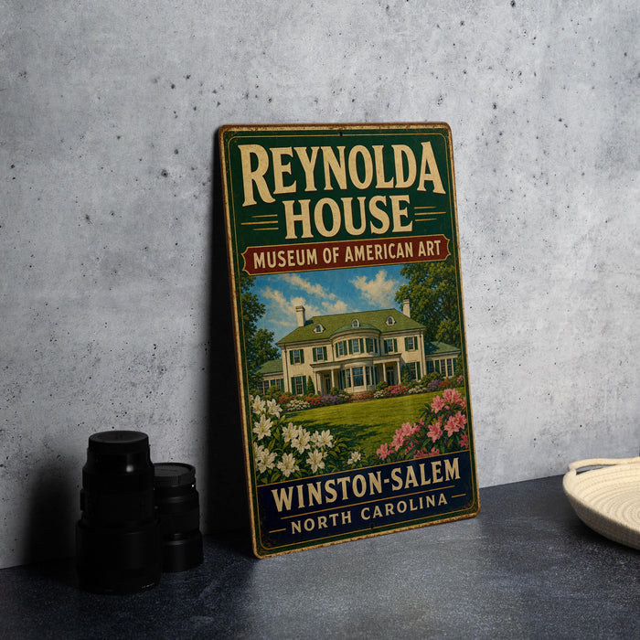A vintage-style sign for the Reynolds House Museum of American Art in Winston-Salem, North Carolina.