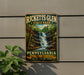 A vintage-style metal sign for Ricketts Glen State Park in Pennsylvania, featuring a waterfall and forest scenery.