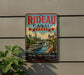 A vintage-style metal sign advertising Rideau Canal in Canada, featuring a scenic illustration of the canal and surrounding architecture.