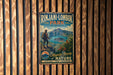 A vintage metal sign for Rinjani-Lombok Park in Indonesia, featuring a hiker in a backpack standing on a cliff overlooking a scenic landscape.