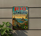 A vintage-style metal sign with the text "Rio de Janeiro" and "Carioca Landscapes" is displayed on a wall, featuring a colorful illustration of the city's landscape and landmarks.