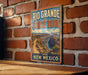 A vintage-style metal sign for the Rio Grande Gorge Trail in New Mexico, featuring a scenic illustration of the Grand Canyon.