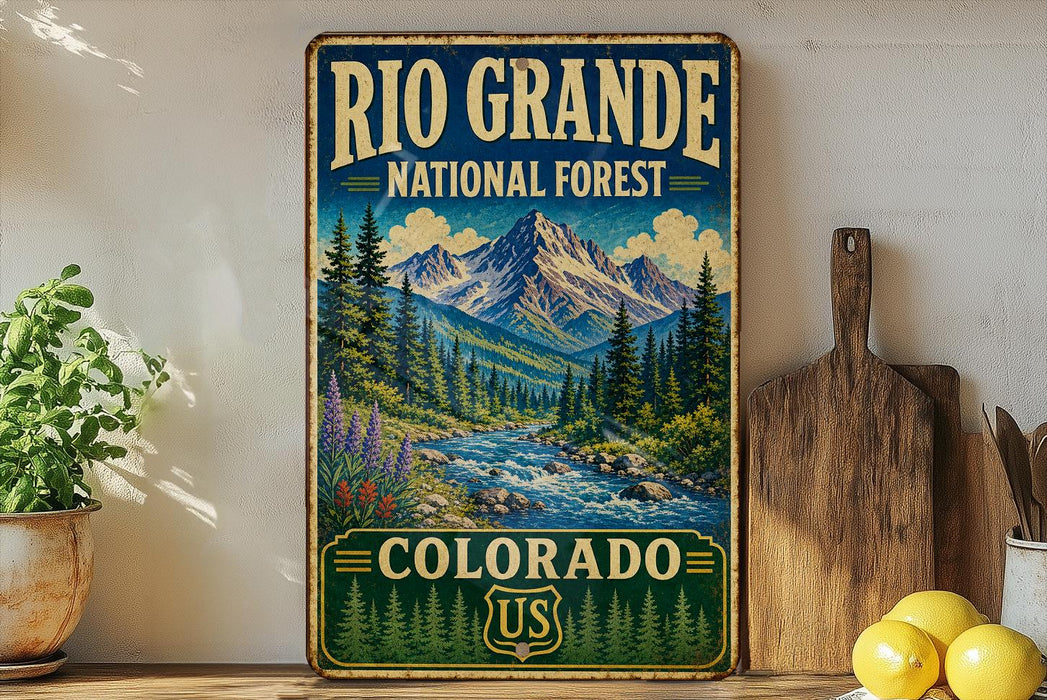 A vintage-style sign for the Rio Grande National Forest in Colorado, featuring a mountain landscape with pine trees and a river flowing through it.
