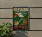 A vintage-style metal sign for the Rio Platano Biosphere Reserve in Honduras, featuring a colorful illustration of a parrot and a jaguar.