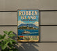a vintage-style sign for Robben Island, South Africa, with a boat and a mountain in the background.