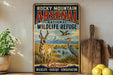 A vintage-style metal sign for Rocky Mountain Arsenal National Wildlife Refuge in Colorado, featuring an illustration of wildlife in a grassy field with mountains in the background.
