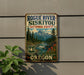 A vintage-style metal sign for Rogue River Siskiyou National Forest, featuring a scenic mountain landscape with a river and pine trees.