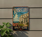 A vintage-style sign for Rosecliff Jewel of Newport, Rhode Island, featuring a large building and a scenic landscape with roses.