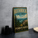 A vintage-style metal sign for Rothrock State Forest in Pennsylvania, featuring a scenic mountain landscape with pine trees and a river.