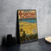 A vintage metal sign displaying the routes of Santiago de Compostela, Spain, with a map and illustrations of landmarks and locations.