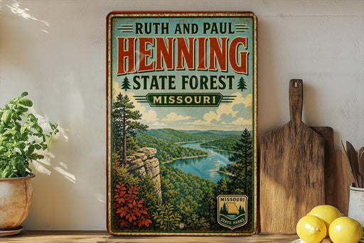 A vintage-style poster of the Missouri State Forest in Ruth and Paul Henning, featuring a scenic landscape with a river and mountains.