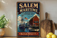 a vintage-style metal sign for Salem Maritime National Historic Site in Massachusetts, with a depiction of a ship and a building.