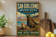 A vintage-style metal sign for San Guillermo Biosphere Reserve in Argentina, featuring a seal and a mountain landscape.