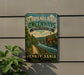 A vintage-style sign for the Schuykill River Greenways National Heritage Area in Pennsylvania, featuring a scenic illustration of a river, bridge, and surrounding landscape.