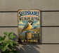 A vintage-style metal sign for the Seedskadee National Wildlife Refuge in Wyoming, featuring a bird perched on a wooden post against a scenic landscape.