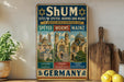 a vintage-style sign for Shum, a UNESCO World Heritage Site in Germany, with illustrations of various religious buildings.