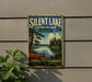 A vintage-style metal sign for Silent Lake Provincial Park, Ontario, featuring a scenic image of a lake with a canoe and pine trees.
