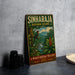 A vintage-style sign for the Sinharaja Biosphere Reserve in Sri Lanka, featuring a colorful illustration of a bird and lush tropical foliage.