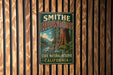 A vintage-style metal sign for the Smithe Redwoods State Natural Reserve in California, featuring a large image of a towering redwood tree and a scenic landscape.