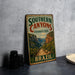 A vintage-style metal sign for Southern Canyons Pathways Park in Brazil, featuring a scenic illustration of the park's natural landscape.