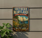 A metal sign on a wall that reads "SOUTHERN MARYLAND NATIONAL HERITAGE AREA" with a sailboat and a house in the background.