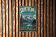 A vintage-style metal sign for Strathcona Provincial Park in British Columbia, Canada, featuring a scenic mountain landscape.