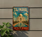 A vintage-style metal sign with the text "Taj Mahal India" and an illustration of the Taj Mahal, a famous mausoleum in India.