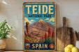 A vintage-style metal sign for Teide National Park in Spain, featuring a mountain landscape with a pine tree and other vegetation.