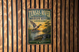 A vintage-style metal sign for the Tensas River National Wildlife Refuge in Louisiana, featuring a duck and alligator in a natural setting.
