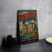 A vintage-style metal sign for "The Breakers" in Rhode Island, featuring an illustration of a building and a body of water.