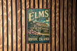 A vintage metal sign with the text "The Elms" and "A Gilded Age Treasure" hangs on a wooden wall.