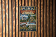 The image is a vintage metal sign that features illustrations of various landmarks in Germany, including palaces, castles, and other historical buildings.