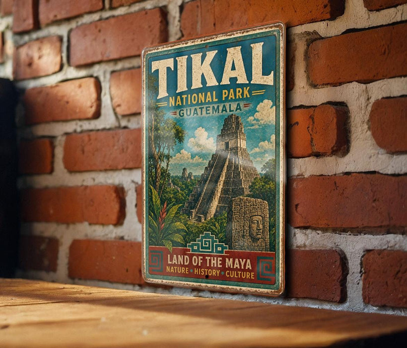 A vintage-style metal sign for Tikal National Park in Guatemala, featuring an illustration of the Mayan ruins of Tikal.