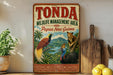 A vintage-style metal sign for the Tonda Wildlife Management Area in Papua New Guinea, featuring illustrations of various animals such as a bird, a bear, and a parrot, along with a tropical landscape.