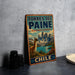 A vintage-style metal sign for the Torres del PAINE Biosphere Reserve in Chile, featuring a llama and a mountainous landscape.